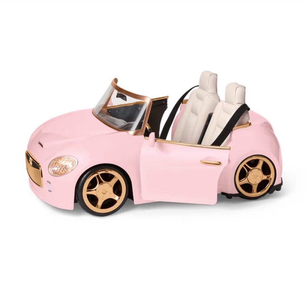American Girl Pink Convertible Ride-On with White Seats and Gold Trim